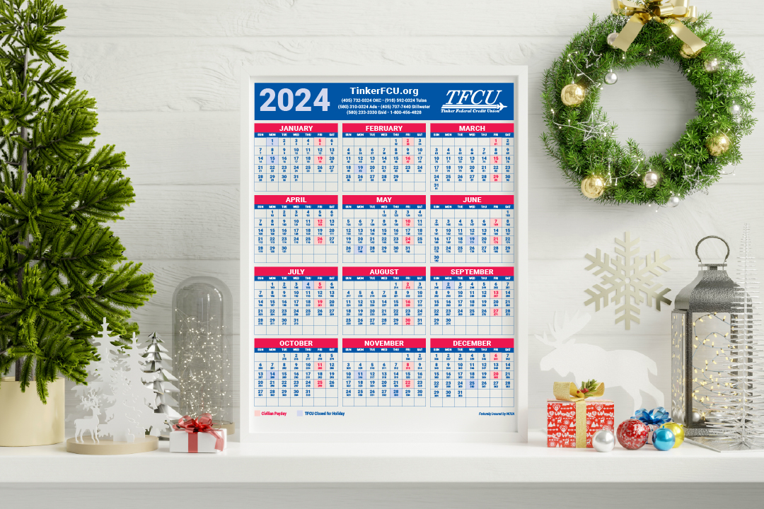 A frame with a 2024 calendar with christmas decorations around it