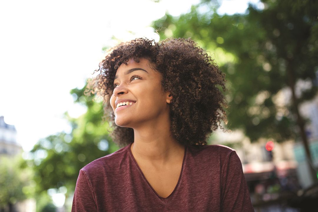 Close up of young woman looking up