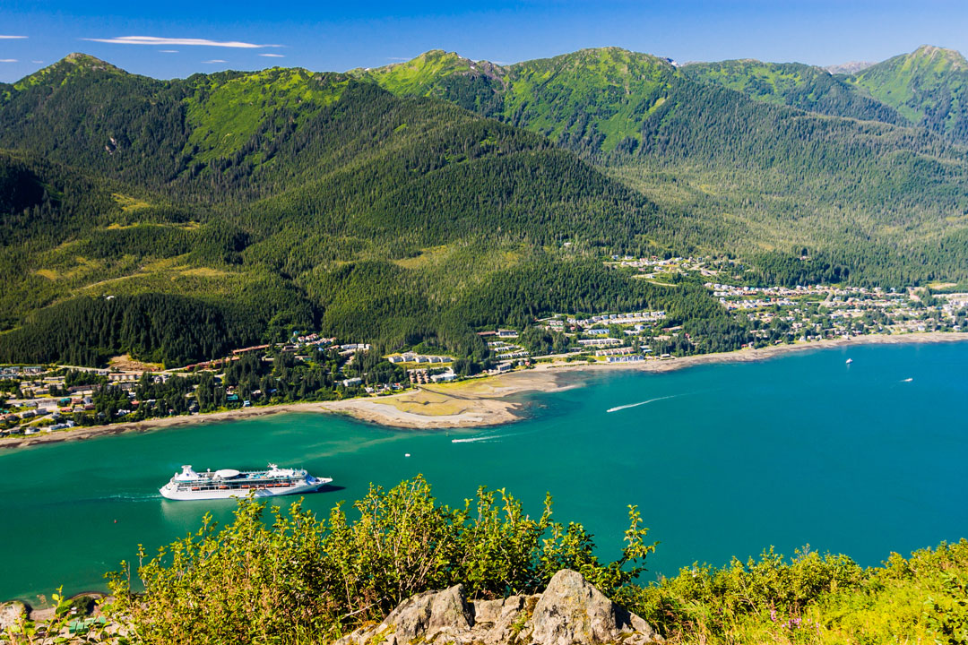 Panaramic view of Alaskan cruise ship pulling into harbor.