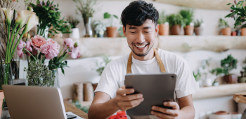 Business owner working from tablet