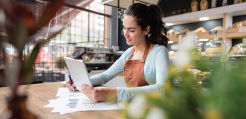 Business owner working from tablet