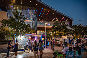 Food trucks in front of a building