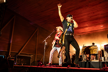 Two country singers on a stage.