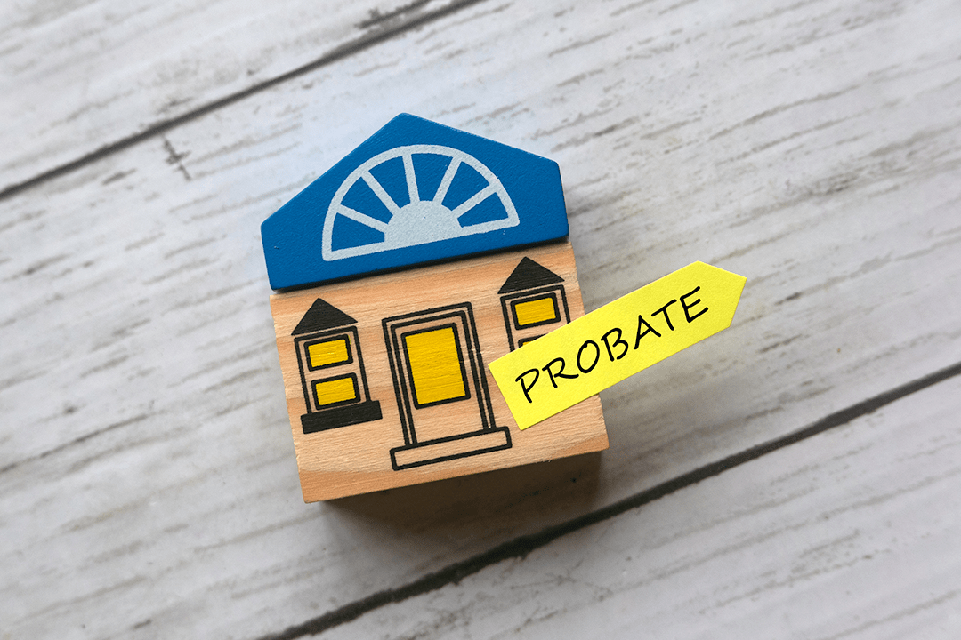 Tiny toy house and the words probate