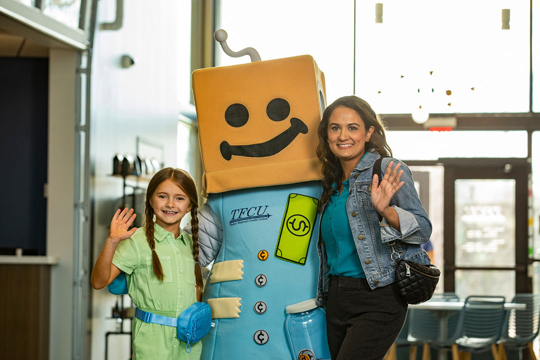 Mom and kid with Save-A-Tron