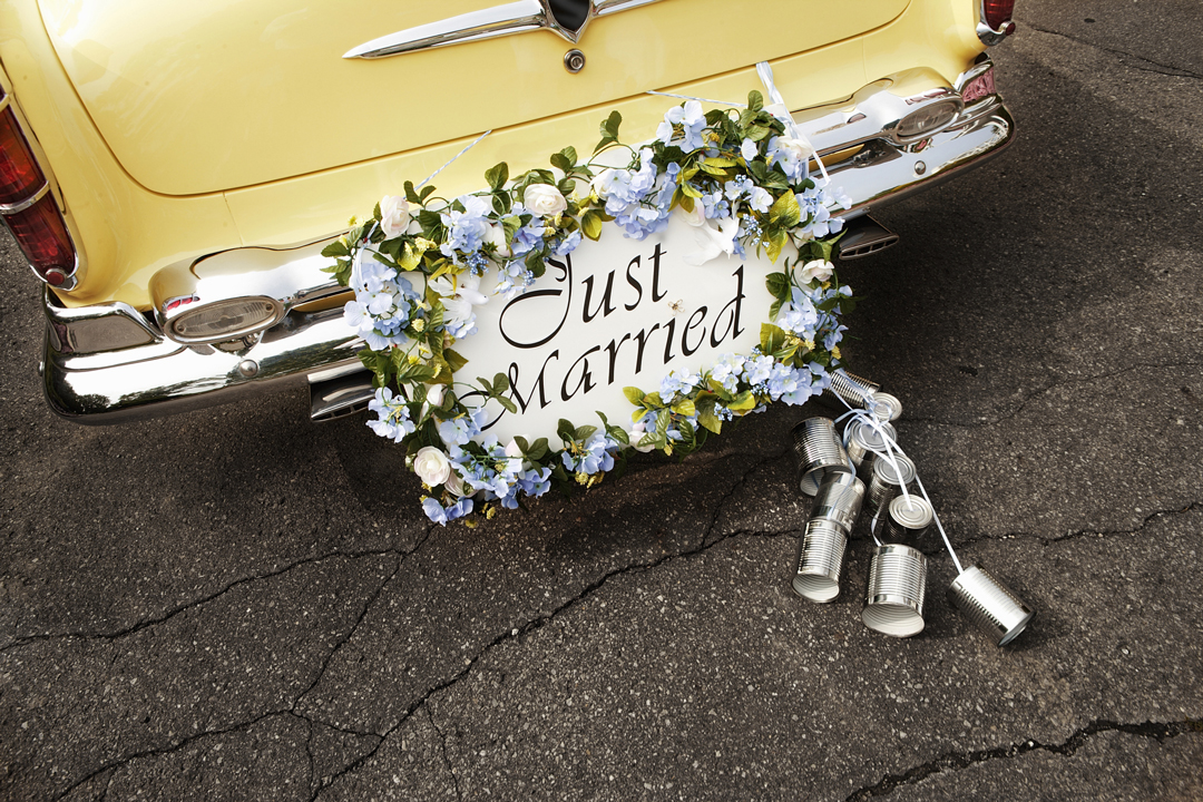 Yellow car with Just Married sign on back