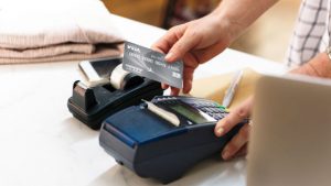 TFCU Platinum Cradeit Card swiped at a retail outlet