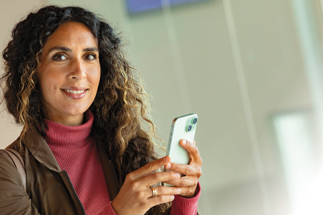 A lady on her mobile device.