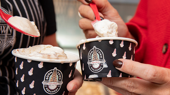 A close up of two cups of Boom Town Creamery ice cream