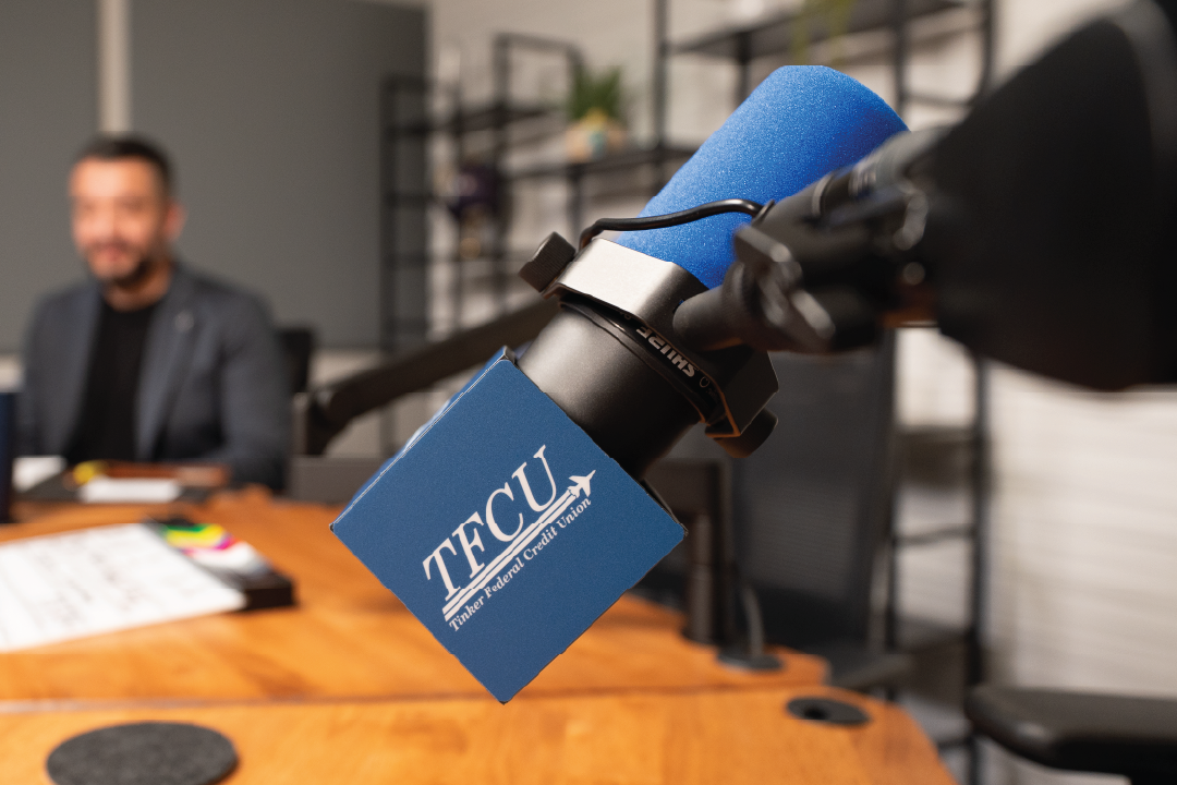 A podcast mic with a TFCU logo on it.