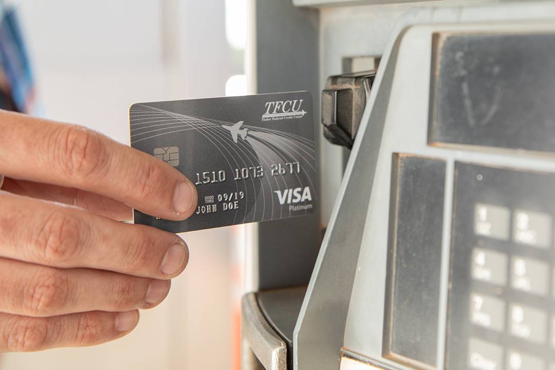 TFCU credit card being used at a gas pump