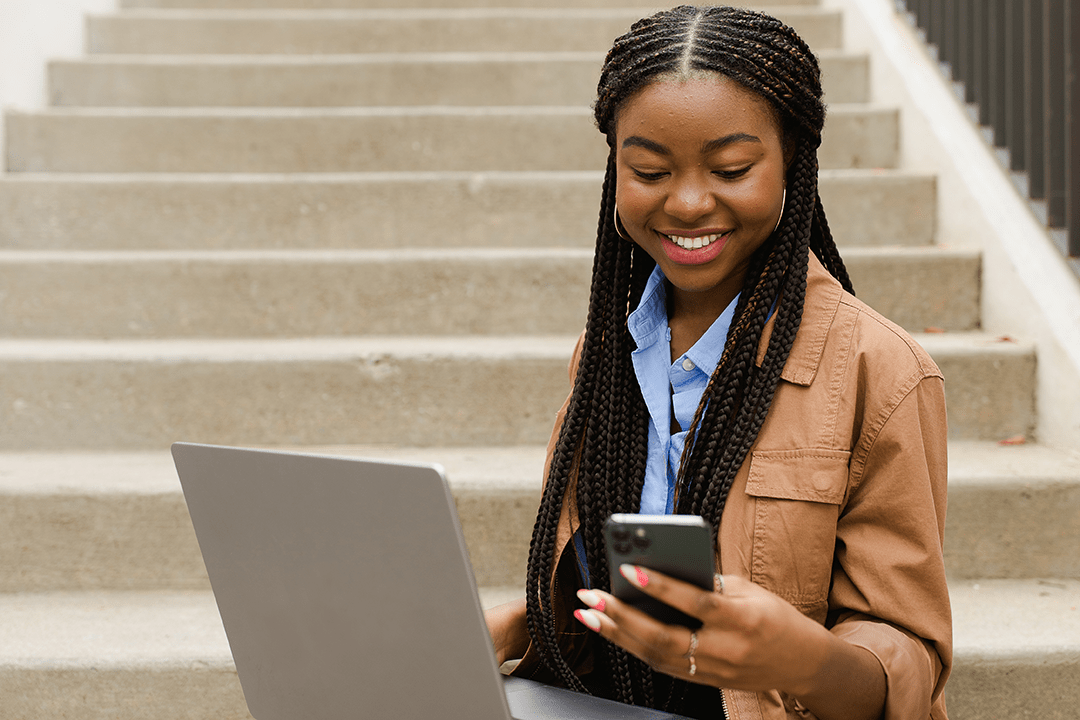 Young adult looking at her phone.